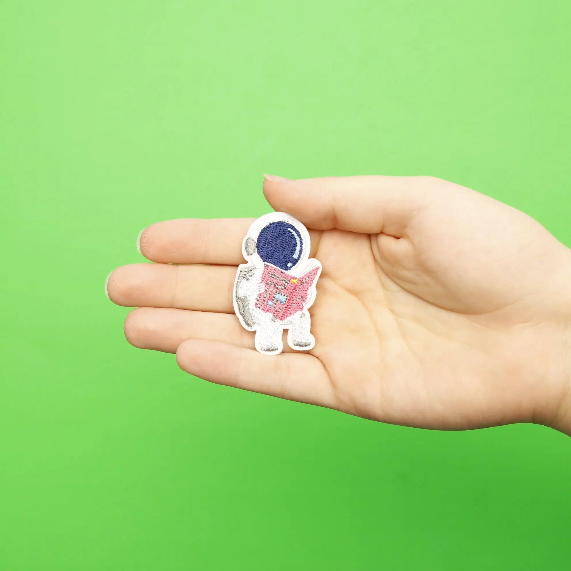Small Astronaut Reading A Book Embroidered Iron On Patch - Image 2
