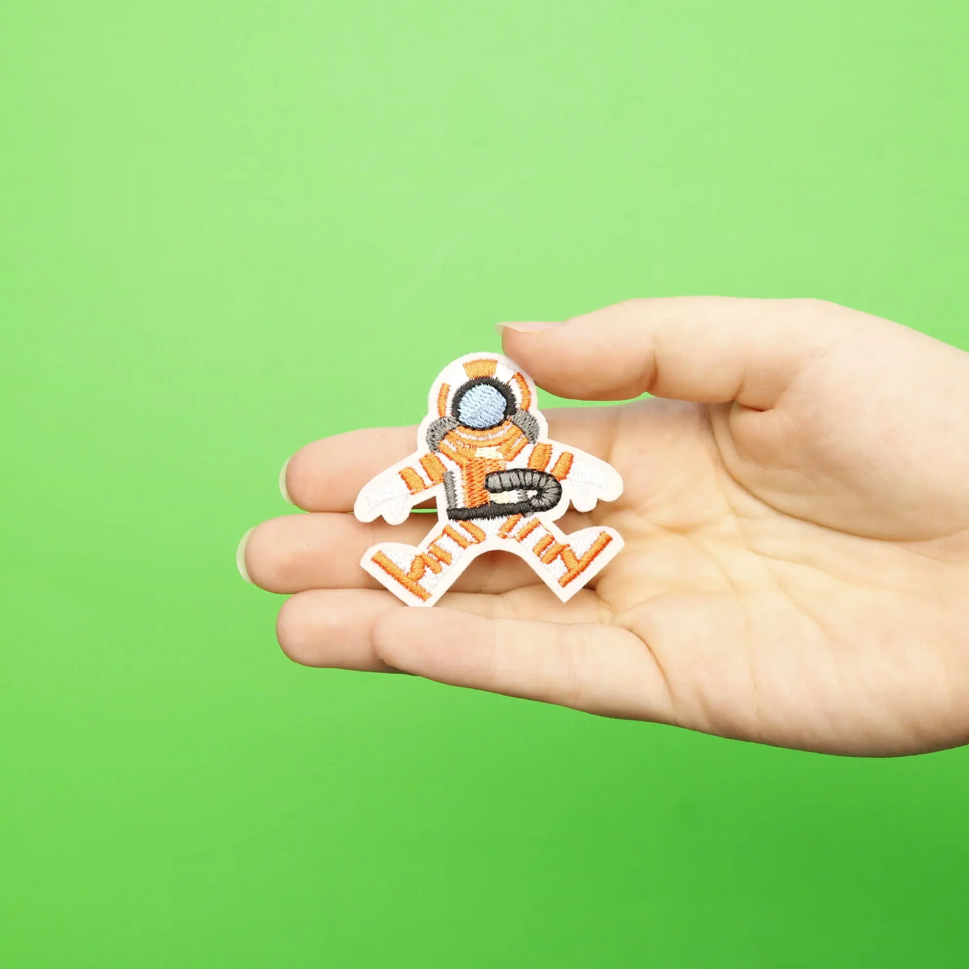 Small Orange Astronaut Embroidered Iron On Patch - Image 2