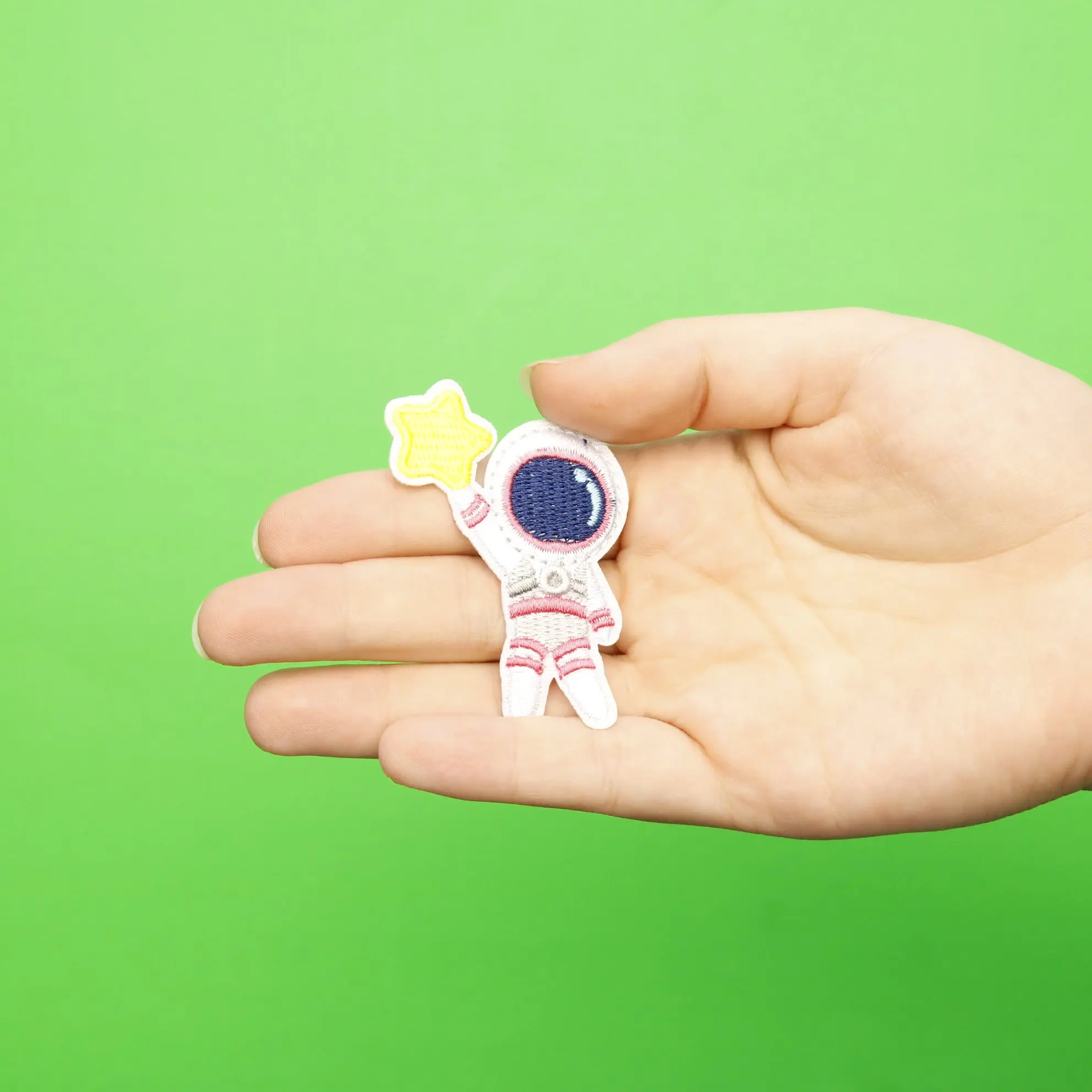 Small Pink Astronaut Holding A Star Embroidered Iron On Patch - Image 2